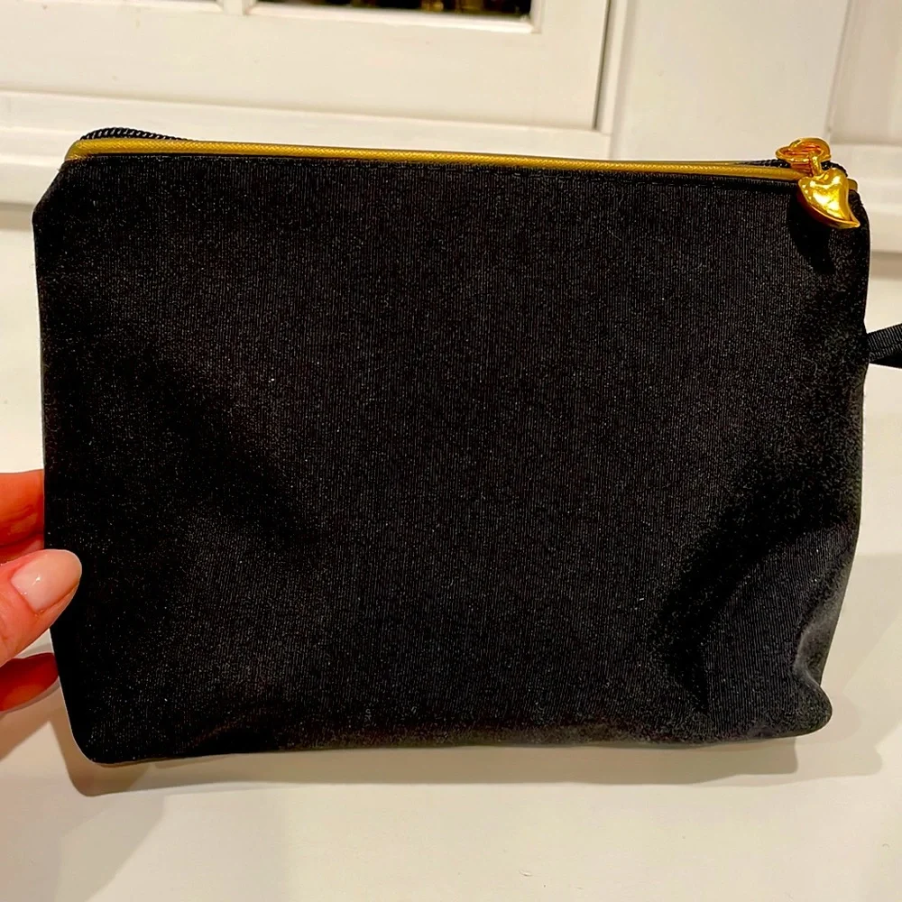 Carlos Falchi Zippered pouch in black with gold detail. New.